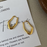 Brincos de aço inoxidável dourados da moda