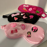 Máscara de pelúcia rosa para os olhos